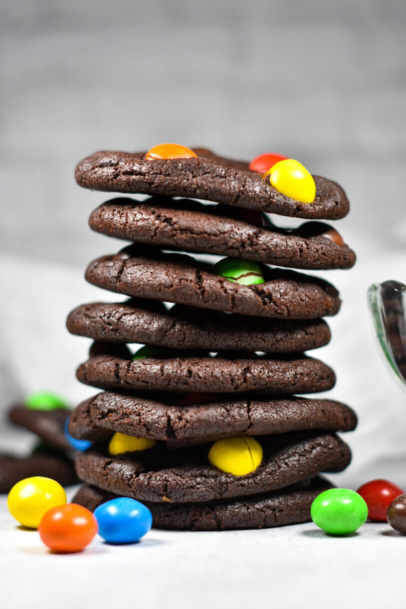 A stack of chocolate M&M cookies