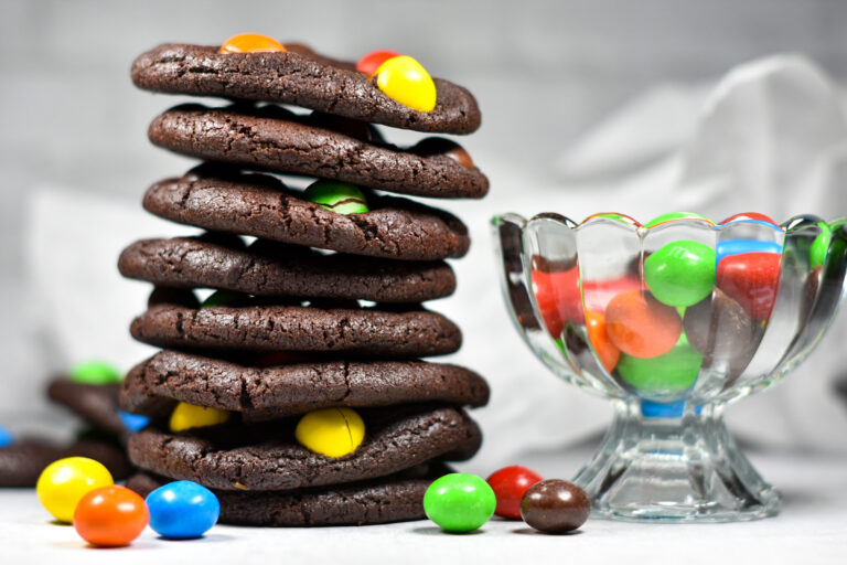 Caramel M&M Cookies and a glass bowl of candy