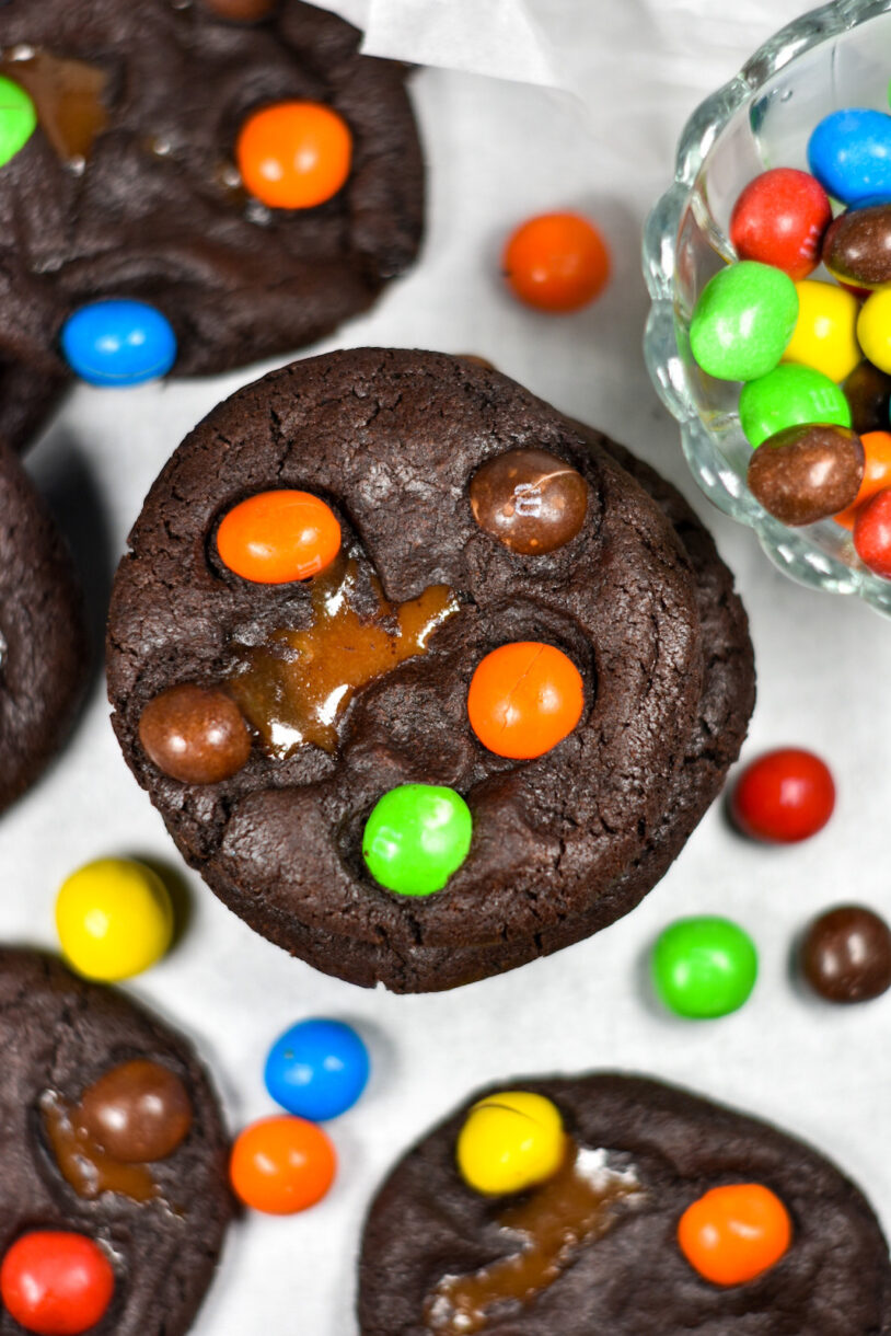 Caramel M&M Cookies and a bowl of M&Ms candy