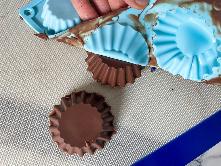 Popping homemade Mallo Cups from a silicone mould