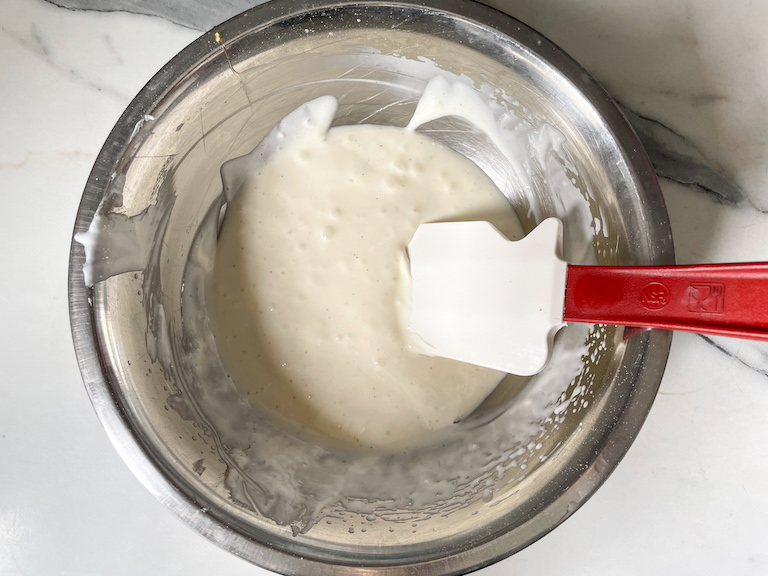Cream cheese filling mixture in a bowl