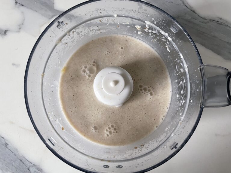 Almond date smoothie in a food processor
