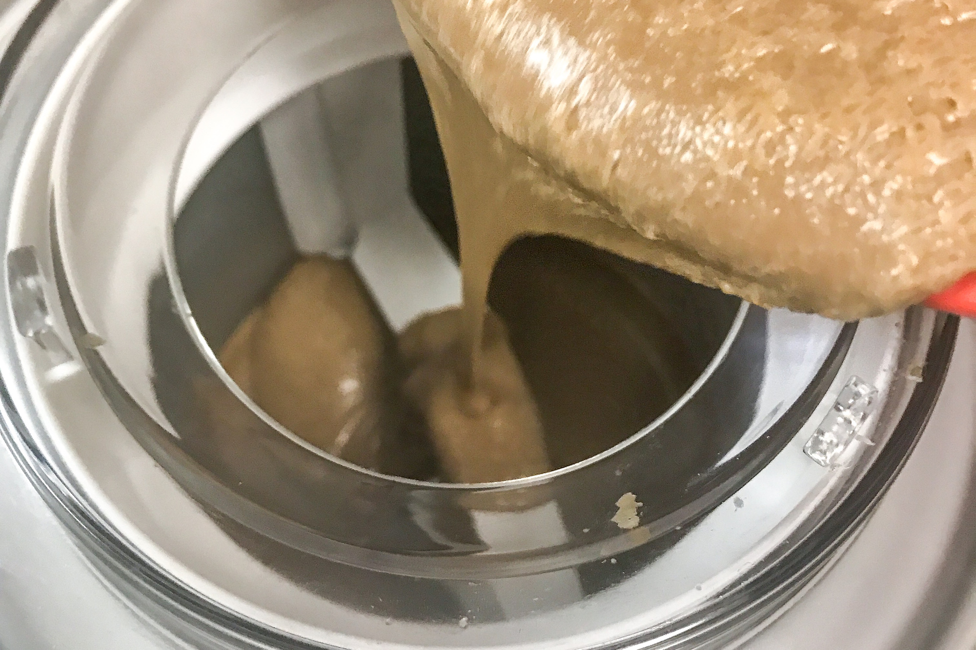 Pouring mixture into ice cream maker