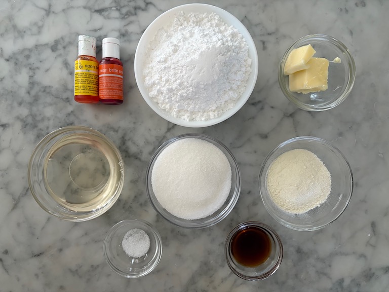 homemade candy corn ingredients arranged on a marble surface