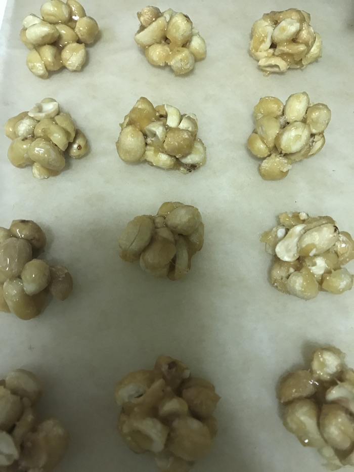 preparing peanut clusters for enrobing