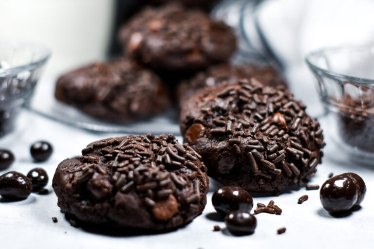 Horizontal shot of two dark chocolate espresso bean cookies