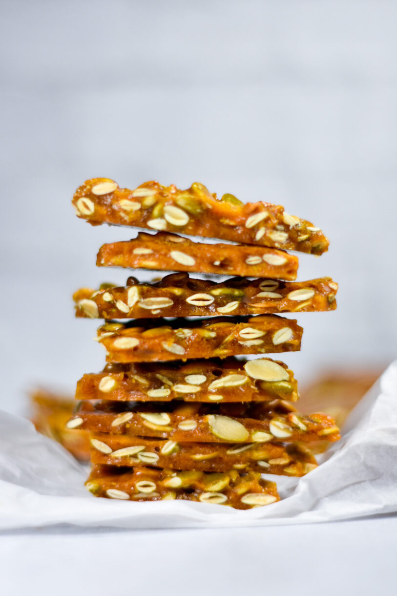 A stack of brittle on a sheet of white parchment