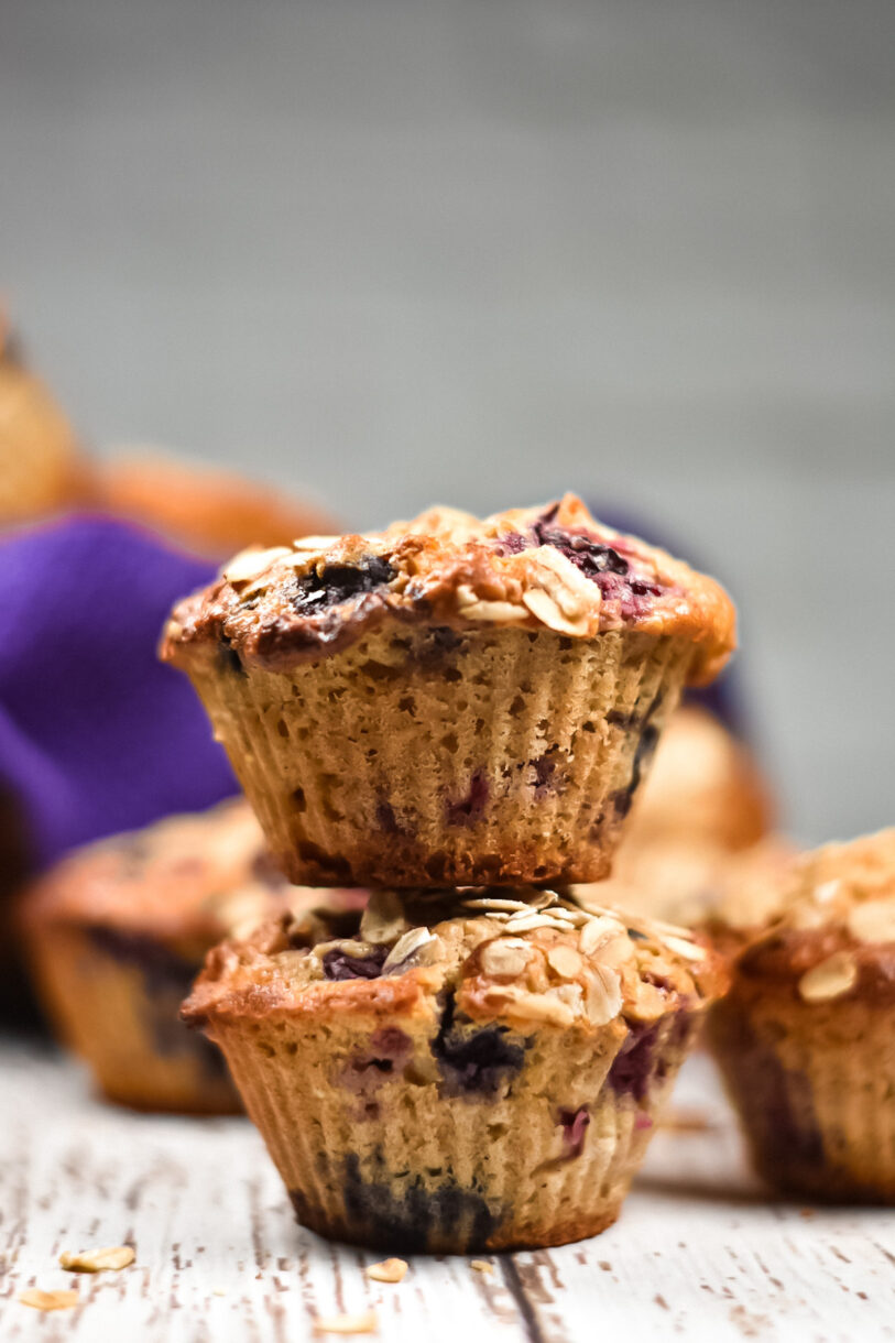 Stack of two mixed berry muffins