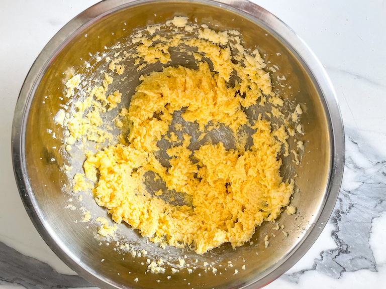 Whipped butter in a metal bowl