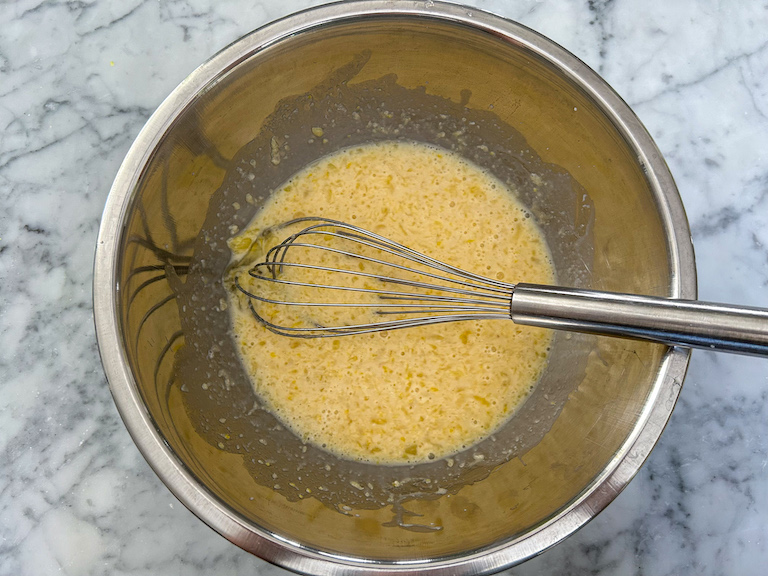 Wet ingredients whisked together in a bowl