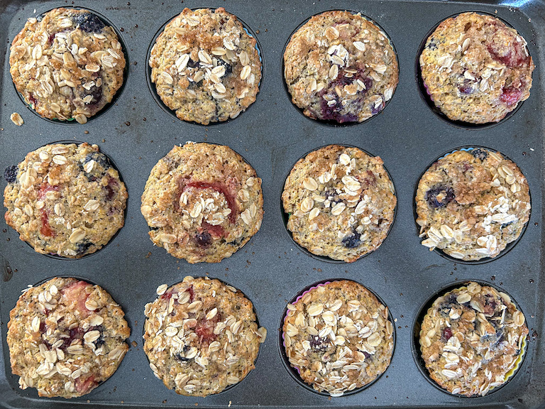 Mixed berry muffins in tin