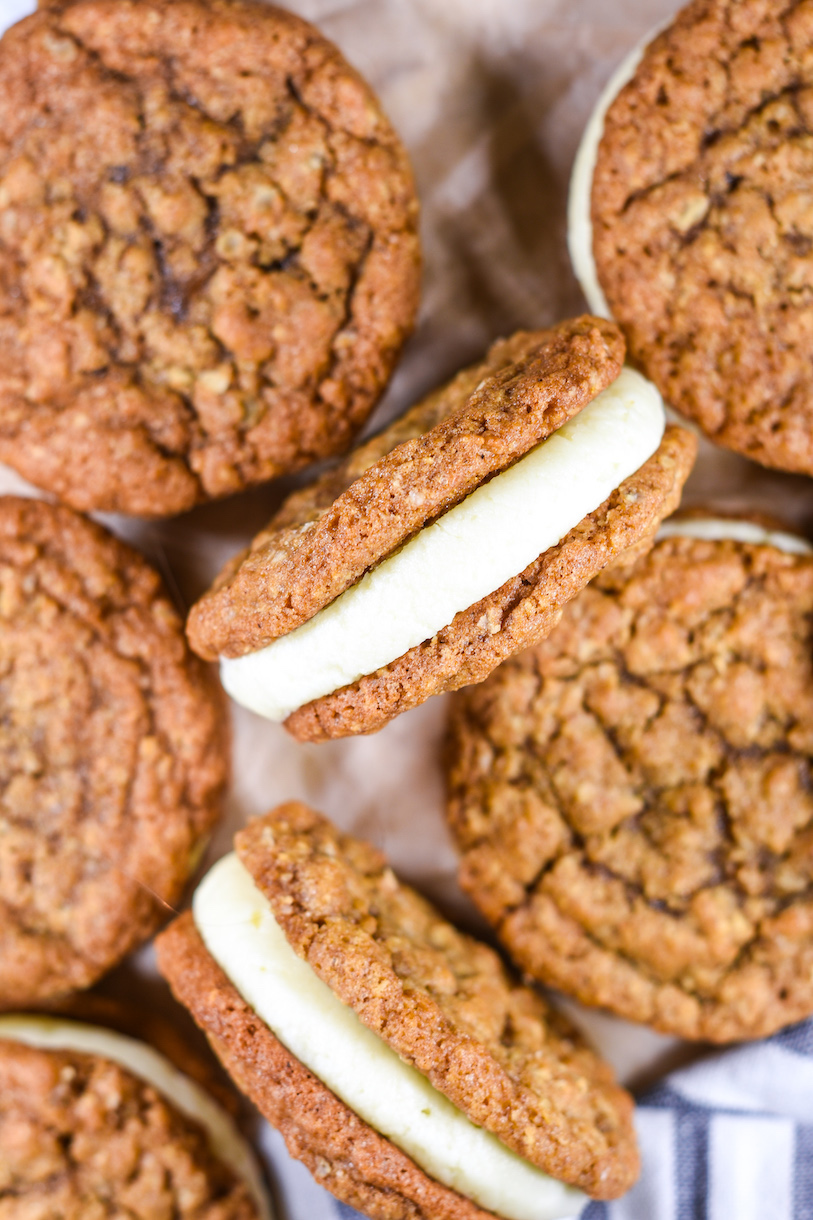 oatmeal cream pies on a sheet of brown parchment