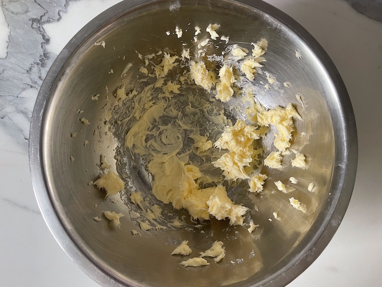 Butter in a metal bowl