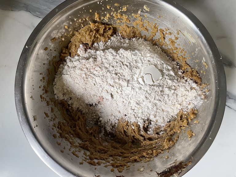 Flour and sugar in a metal bowl