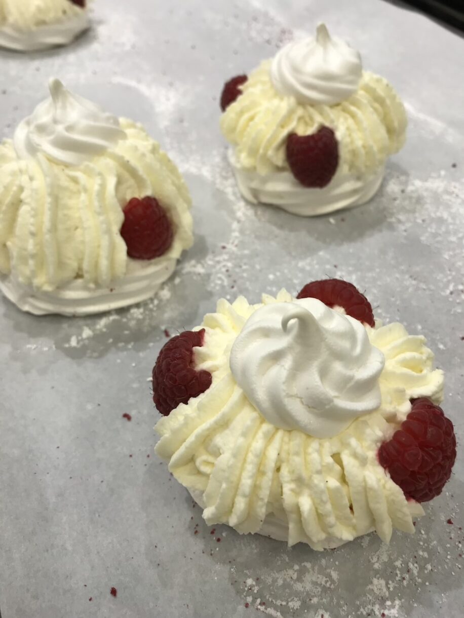 Meringues with raspberries and cream