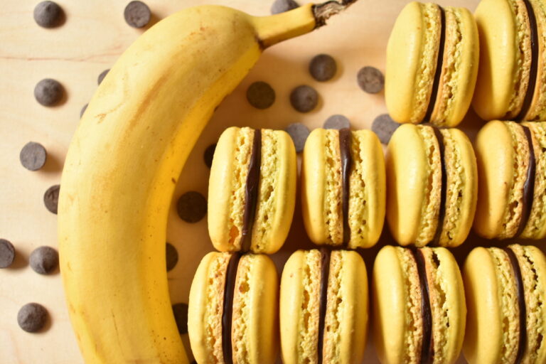 Chocolate and banana macarons and a fresh banana