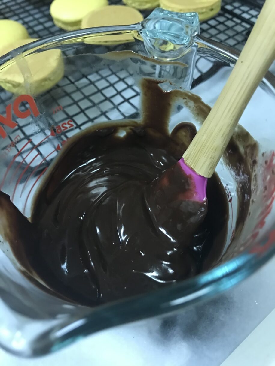 Chocolate ganache in a measuring jug