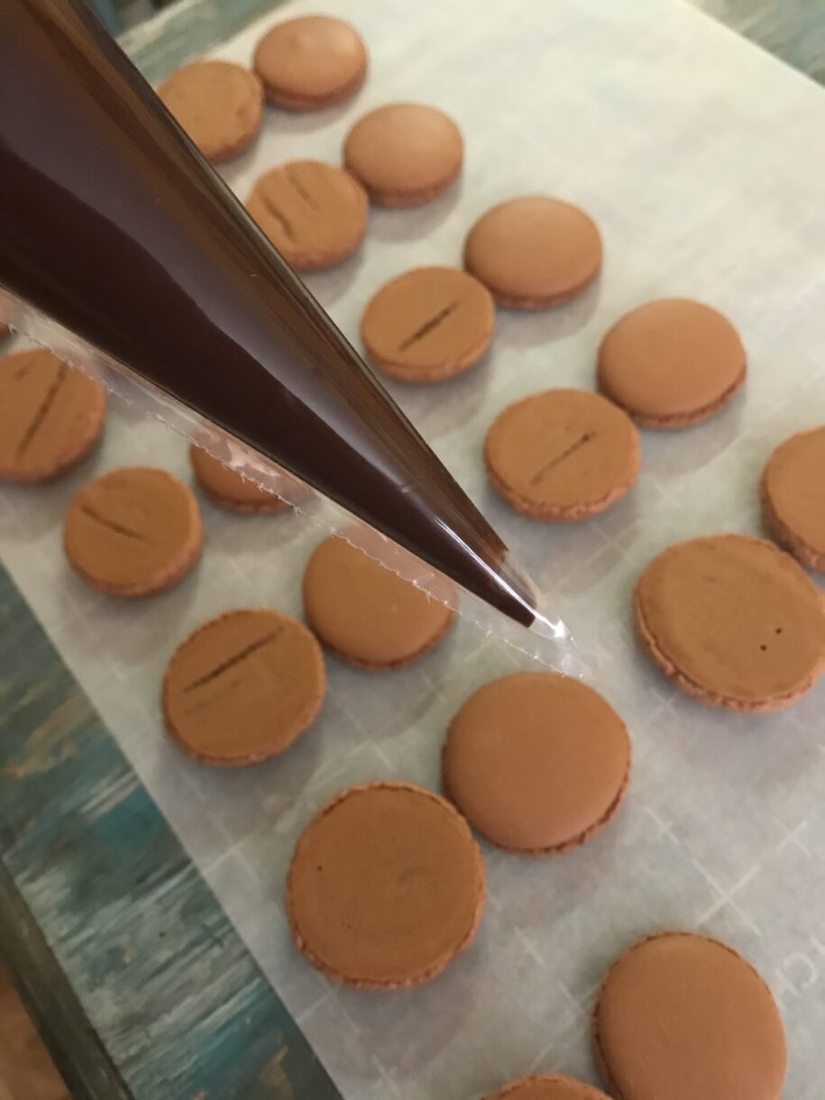 Making chocolate macarons with chocolate ganache