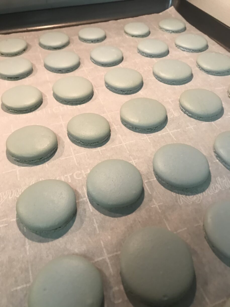 Blue macaron shells after baking