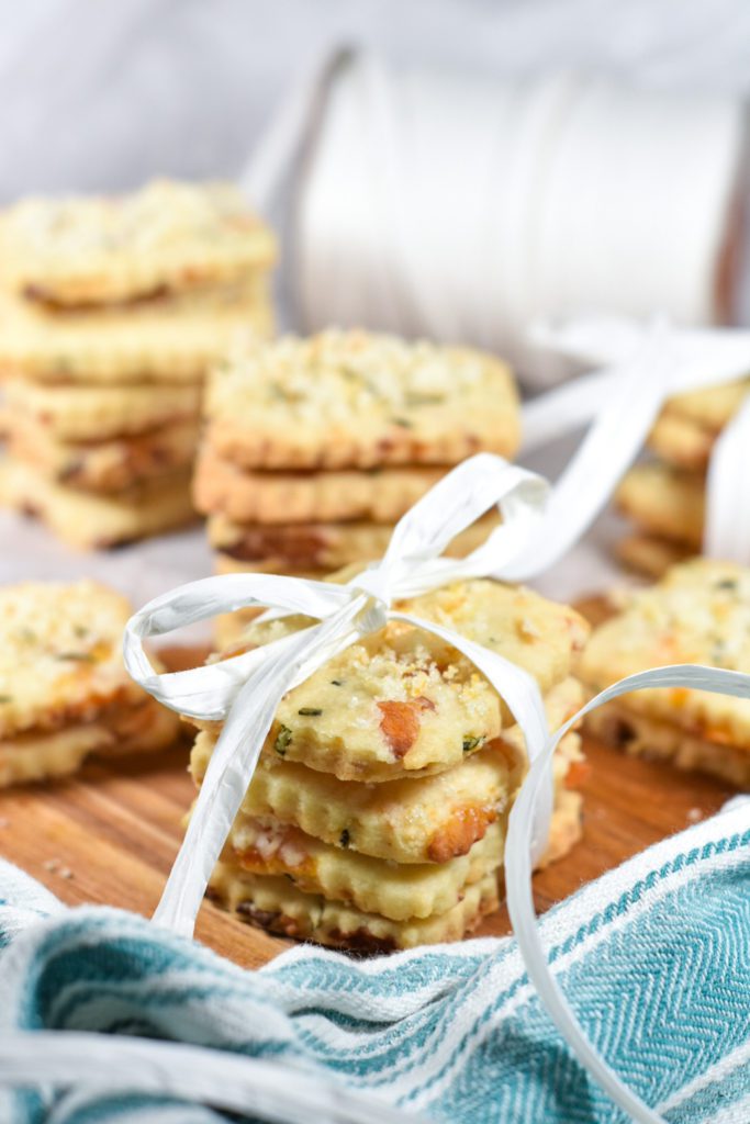 Apricot shortbread biscuits in a stack with a raffia ribbon