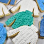 Royal icing sweater cookies