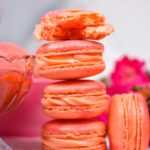 Stack of pink and orange macarons