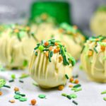 Green and white cake balls with Saint Patrick's Day sprinkles