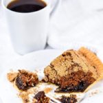 Slice of shoo fly pie and a cup of coffee