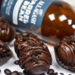 Espresso bean truffle and a bottle of beer