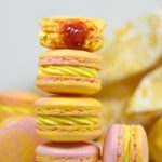 Stack of pink and yellow macarons