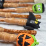 Halloween pretzel sticks with fondant decoration