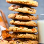 Food photograph of a stack of cookies nexxt to a glass of milk