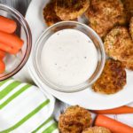 Veggie nuggets on a plate with ranch dip and carrot sticks