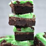 Stack of brownies with green buttercream