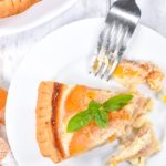 Peach custard pie slice on white plate