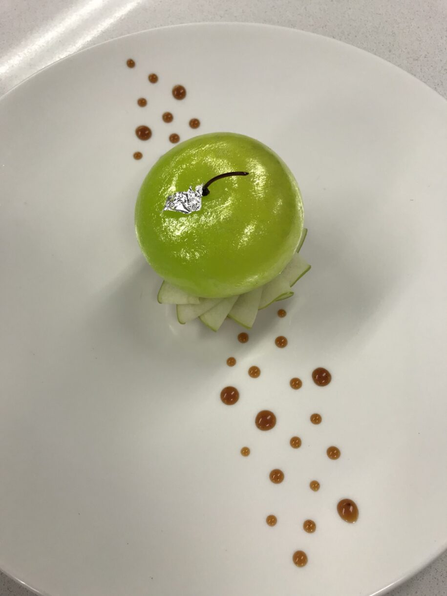 Modern apple tart with blown sugar apple