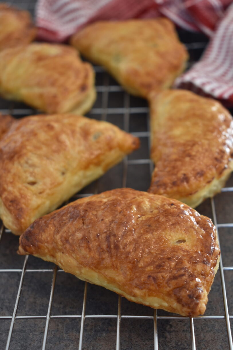Apple turnovers on a wire cooling rack