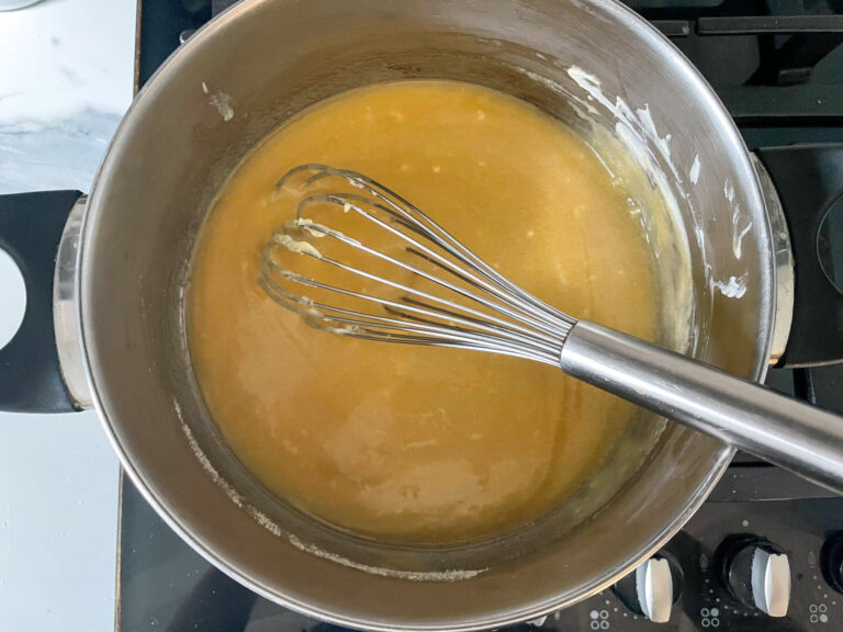 Clotted cream fudge ingredients in pan