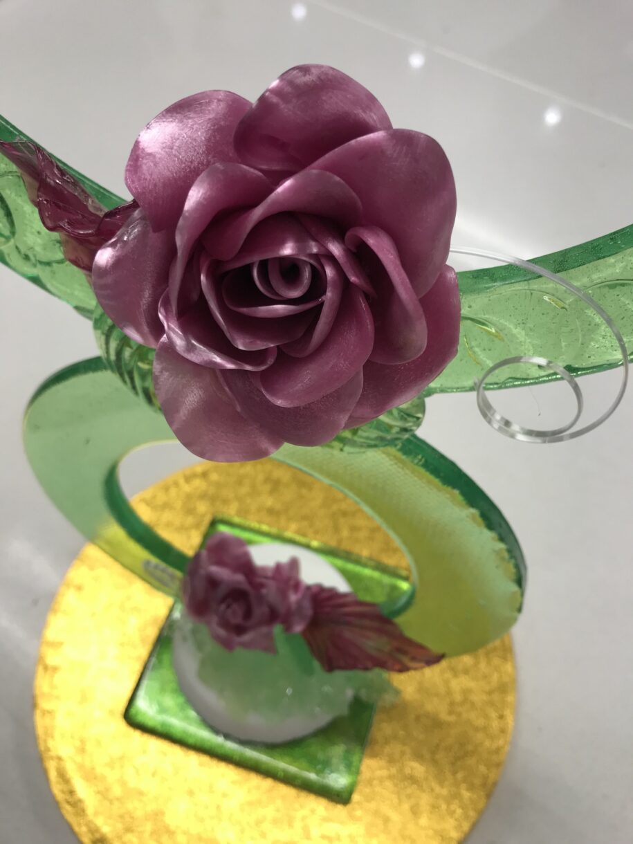 Sugar showpiece with closeup of pulled sugar rose