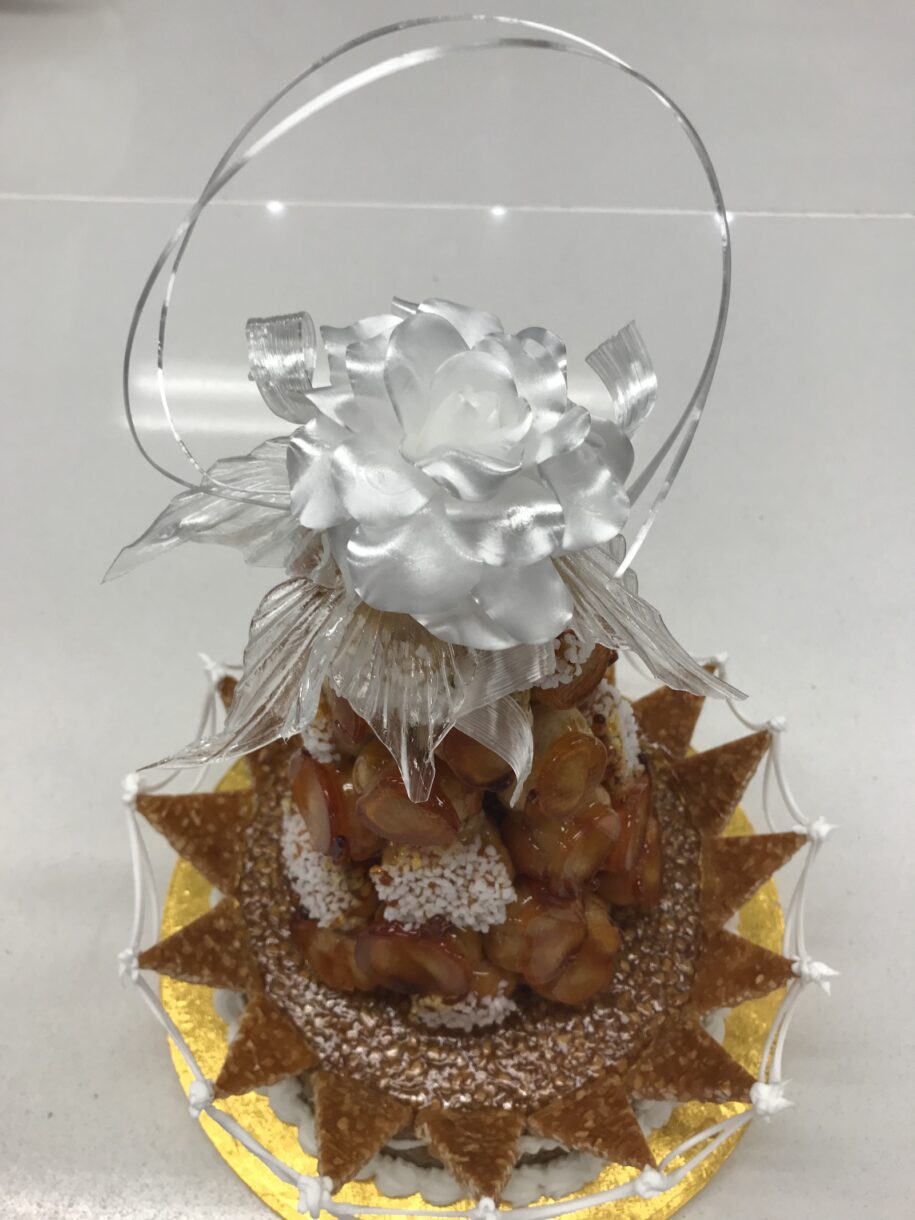 Croquembouche with pulled sugar rose, made in the kitchen at Le Cordon Bleu London