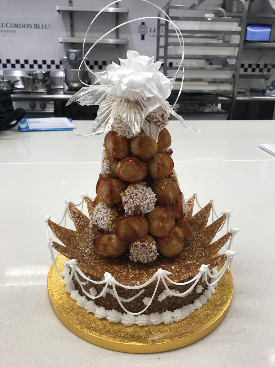 Croquembouche with pulled sugar rose, in a kitchen at Le Cordon Bleu