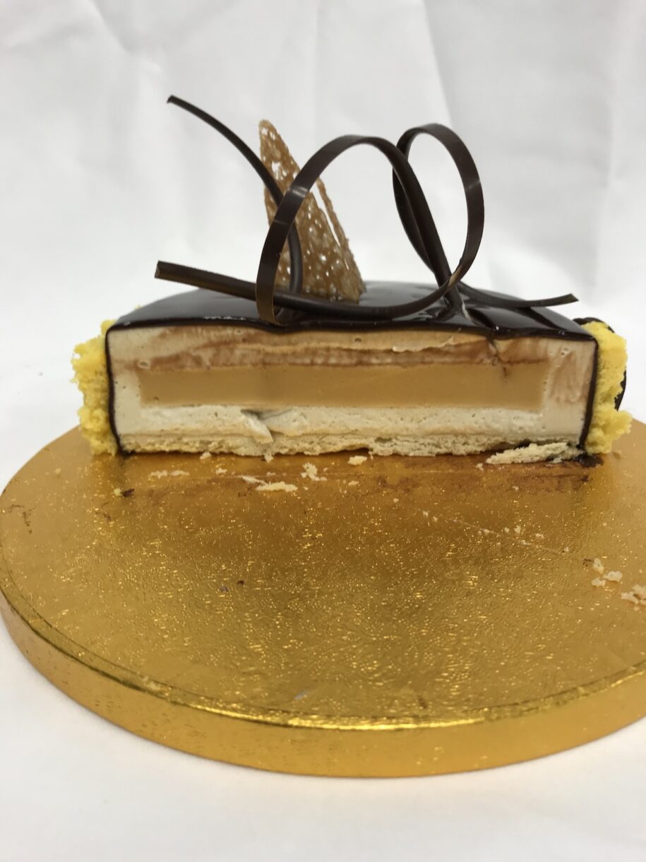 Entremet cross section showing mousse and cremeaux layers