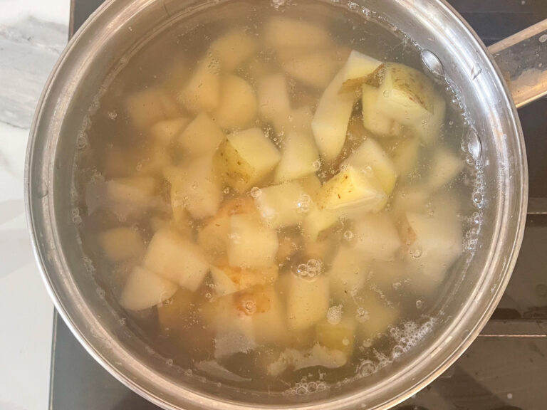Potatoes cooking in a saucepan