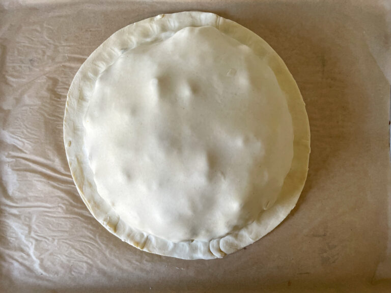 Unbaked pithivier on tray