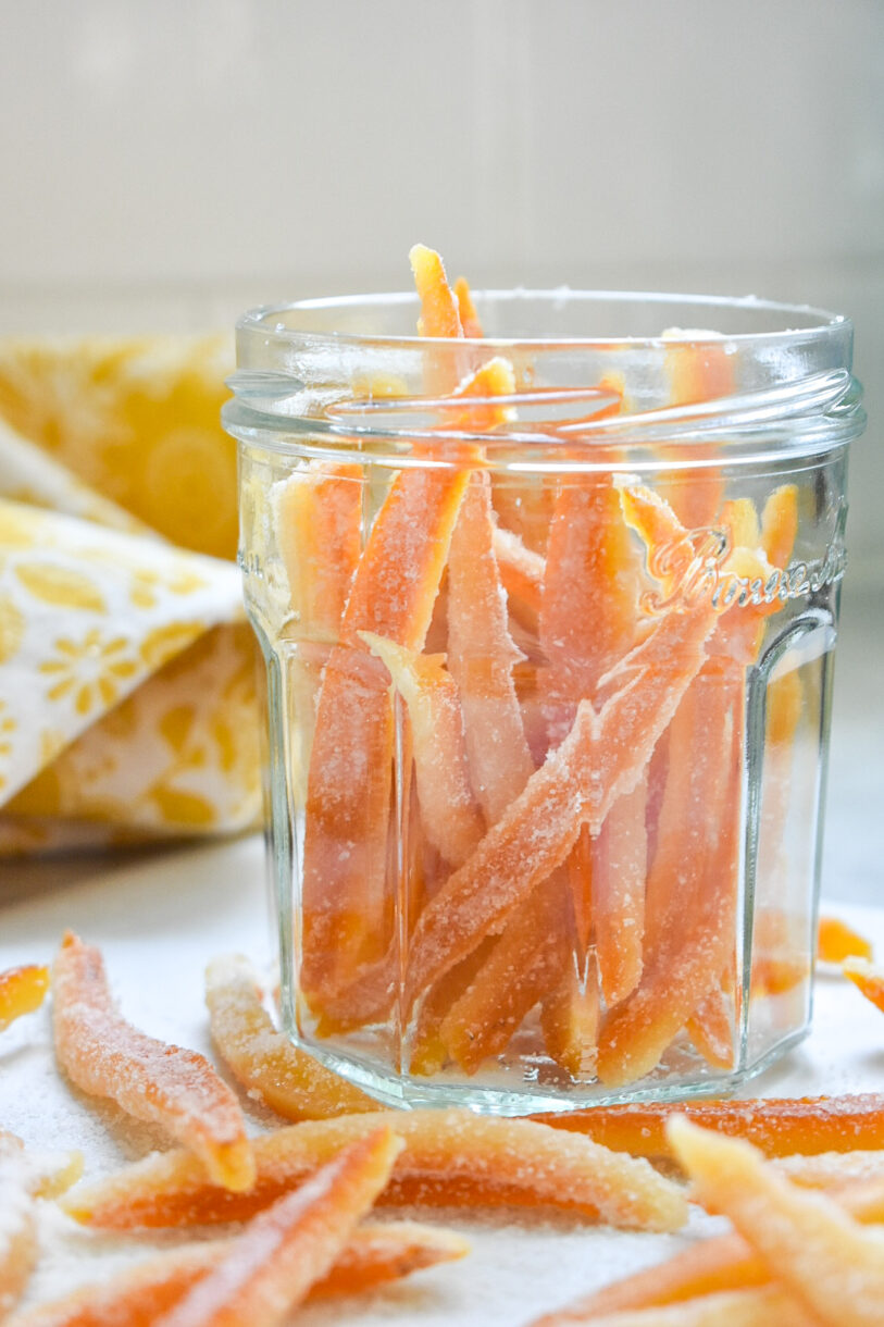 Candied orange peels in a glass jar