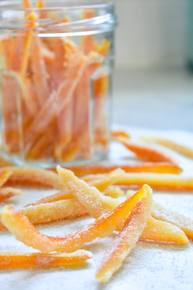 Candied orange peels in a glass jar