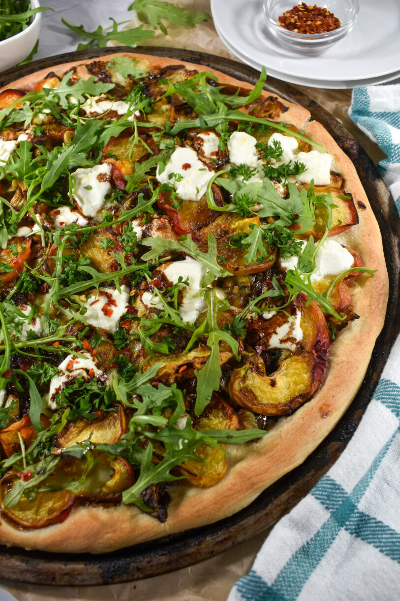 Peach and goat cheese pizza