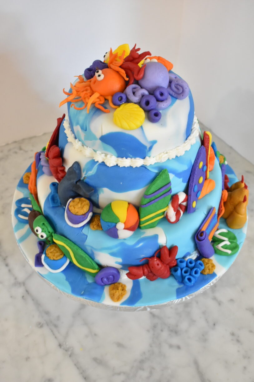 Beach themed cake decorated with fondant