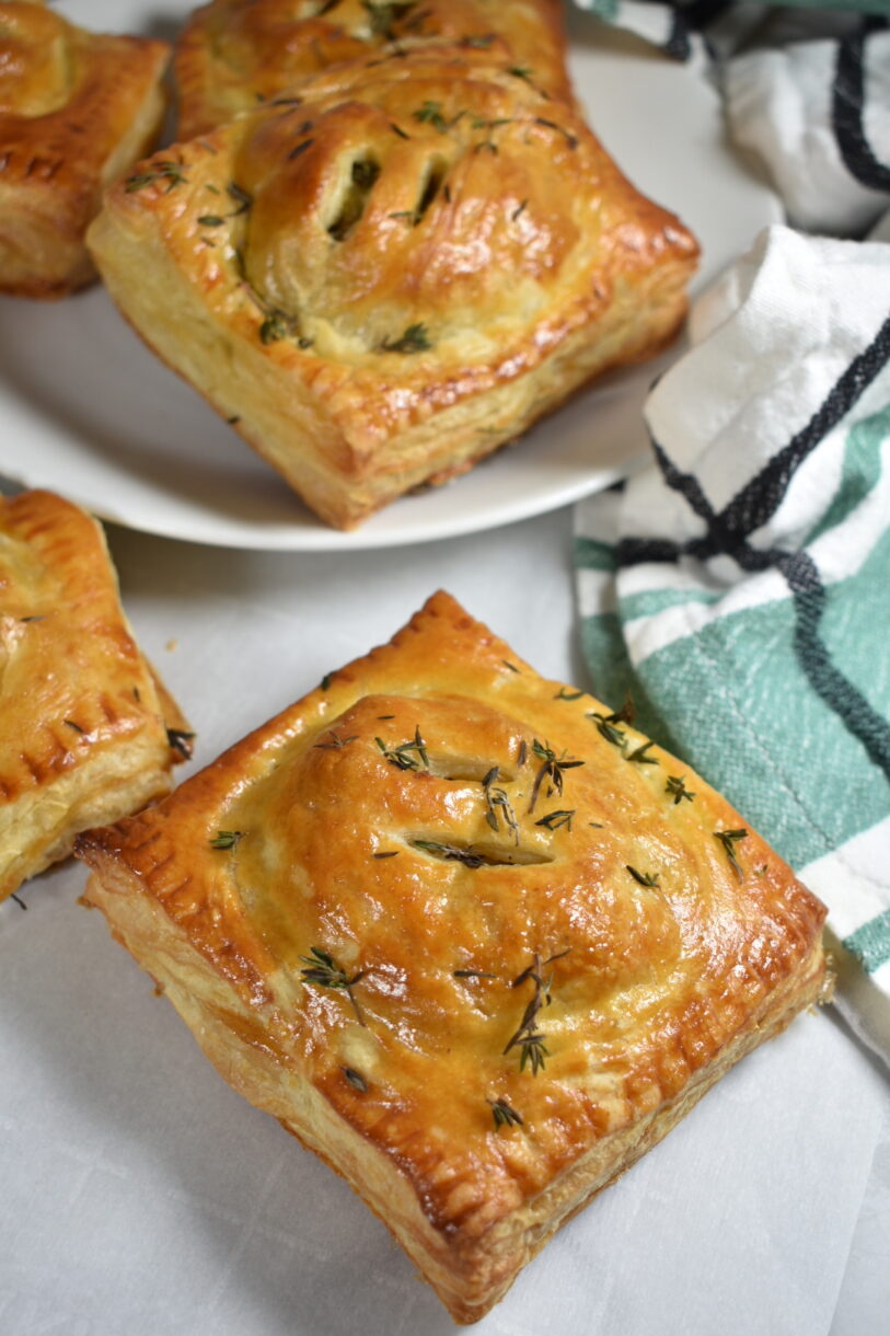 puff pastry hand pies and a green tea towel