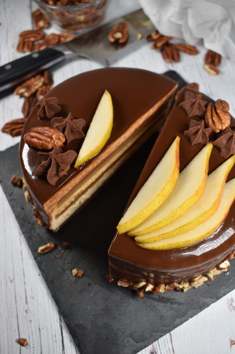 Autumn pear mousse cake with pears, pecans, and chocolate ganache